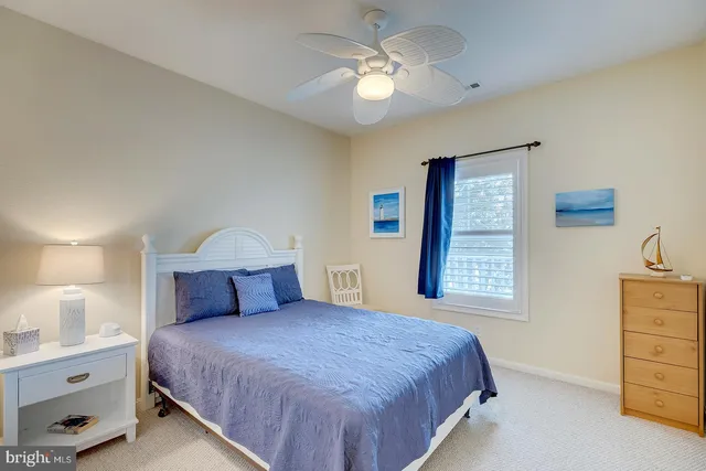 a balcony view with a couch and a table
