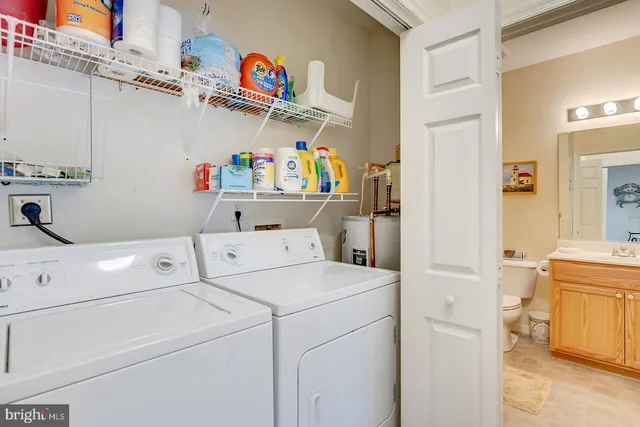 an aerial view of a house with a ocean view