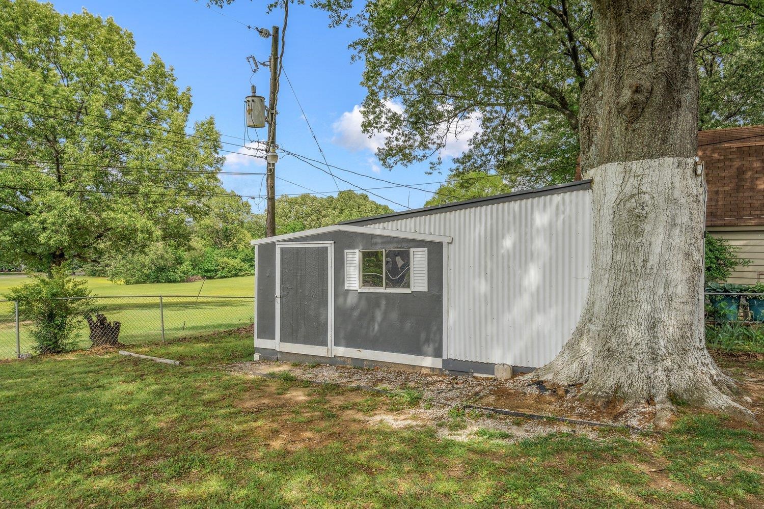 5040 Warrington Road Memphis, TN 38118 - Photo 29 of 29 View of outbuilding featuring fence