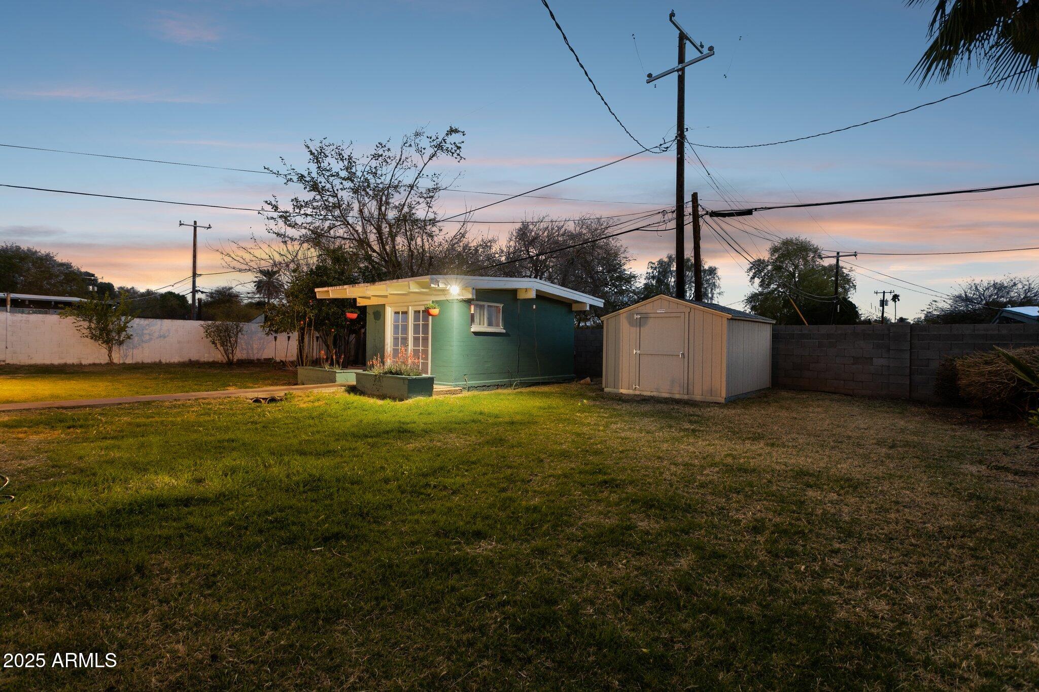 1009 East Bethany Home Road Phoenix, AZ 85014 - Photo 52 of 63 a house view with a garden