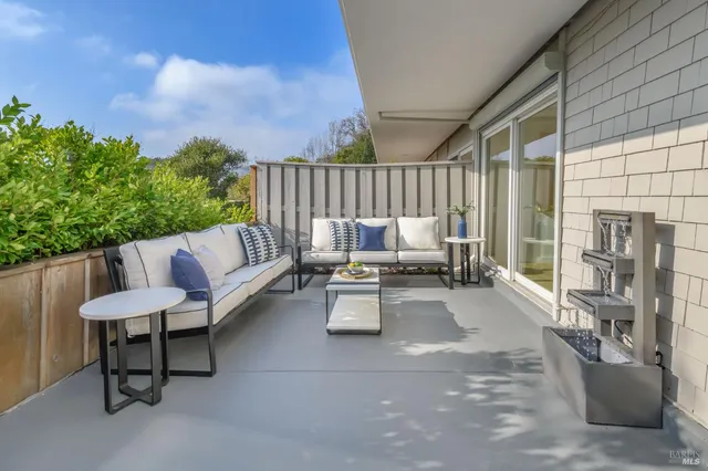a patio view with patio furniture