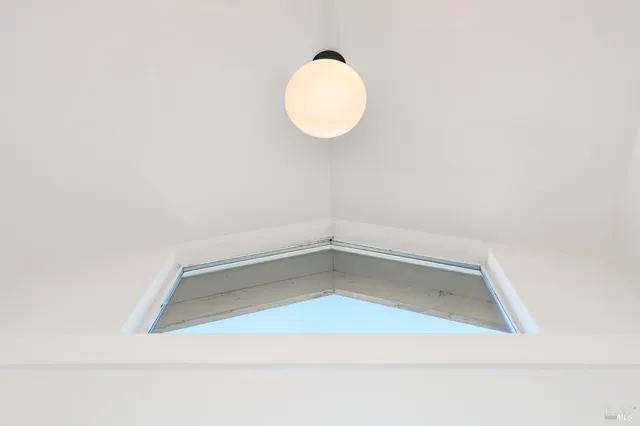 a view of a bathtub in a bathroom