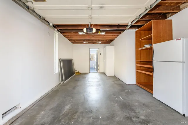 a view of a house with a swimming pool and a yard