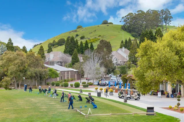 a sign that is on a brick wall