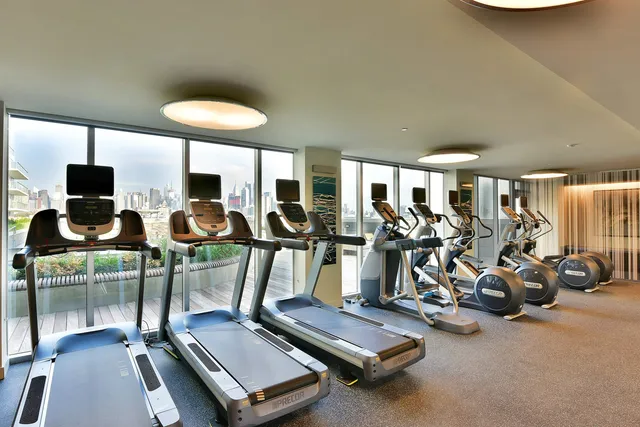 a room with lot of wall paintings and a painting on the wall