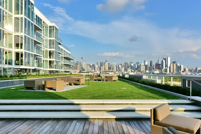 a front view of a building with garden