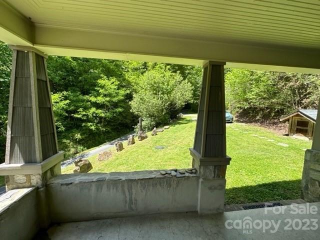 34 Coosa Rdg Drive Whittier, NC 28789 - Photo 19 of 44 a view of a garden from a window