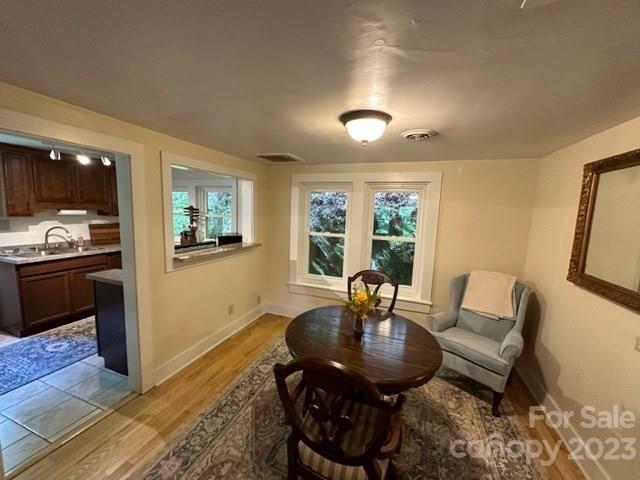 34 Coosa Rdg Drive Whittier, NC 28789 - Photo 20 of 44 a living room with furniture and a large window