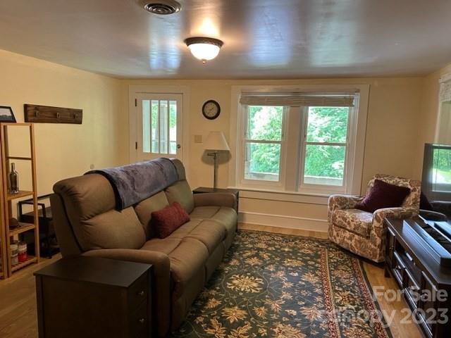 34 Coosa Rdg Drive Whittier, NC 28789 - Photo 26 of 44 a living room with furniture and a large window