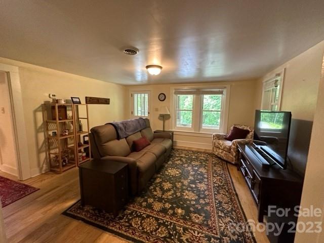 34 Coosa Rdg Drive Whittier, NC 28789 - Photo 27 of 44 a living room with furniture and a flat screen tv