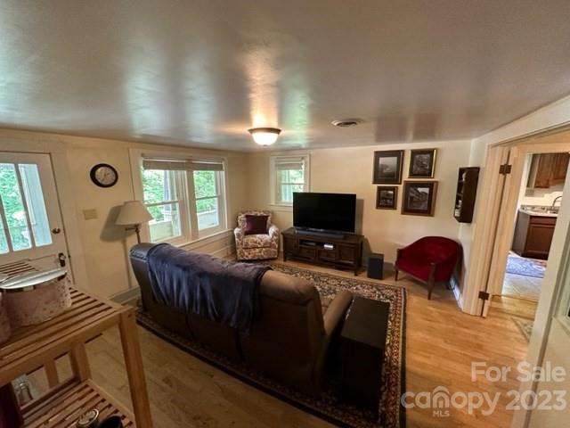 34 Coosa Rdg Drive Whittier, NC 28789 - Photo 28 of 44 a living room with furniture and a flat screen tv