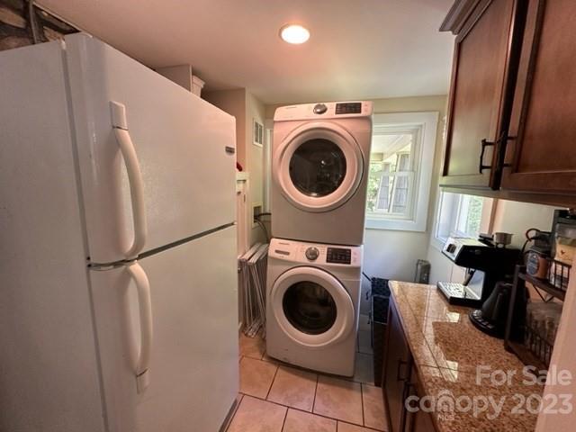34 Coosa Rdg Drive Whittier, NC 28789 - Photo 29 of 44 a view of a storage and utility room with washer and dryer