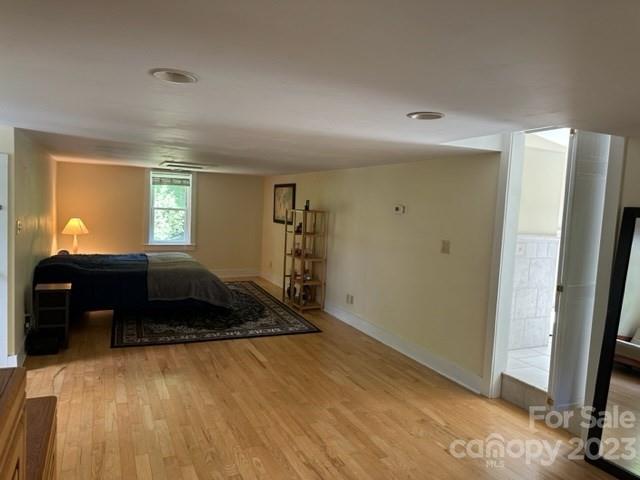 34 Coosa Rdg Drive Whittier, NC 28789 - Photo 33 of 44 a bedroom with a bed and a window