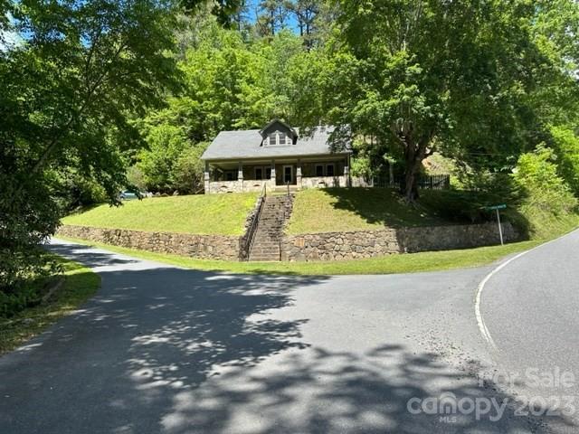 34 Coosa Rdg Drive Whittier, NC 28789 - Photo 8 of 44 a view of a house with a yard and tree s
