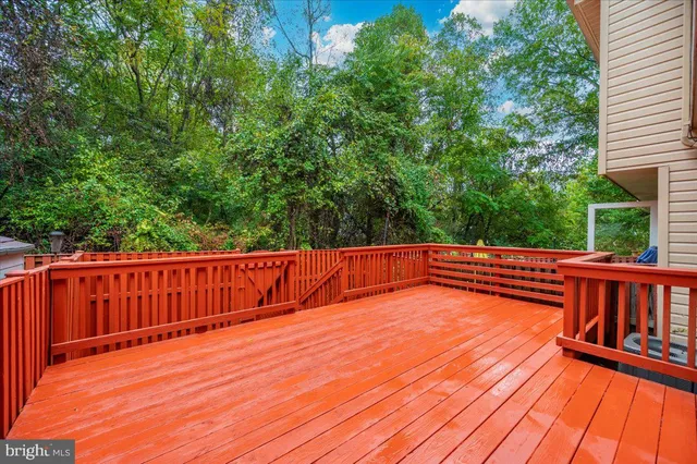 a view of deck with a wooden fence