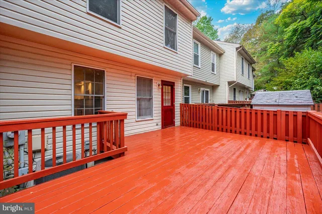 a balcony with wooden floor