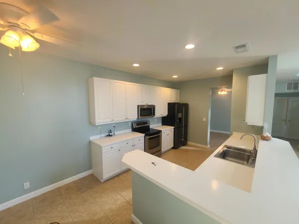 $349,900 | 10499 Southwest West Park Avenue, Port St. Lucie, FL 34987