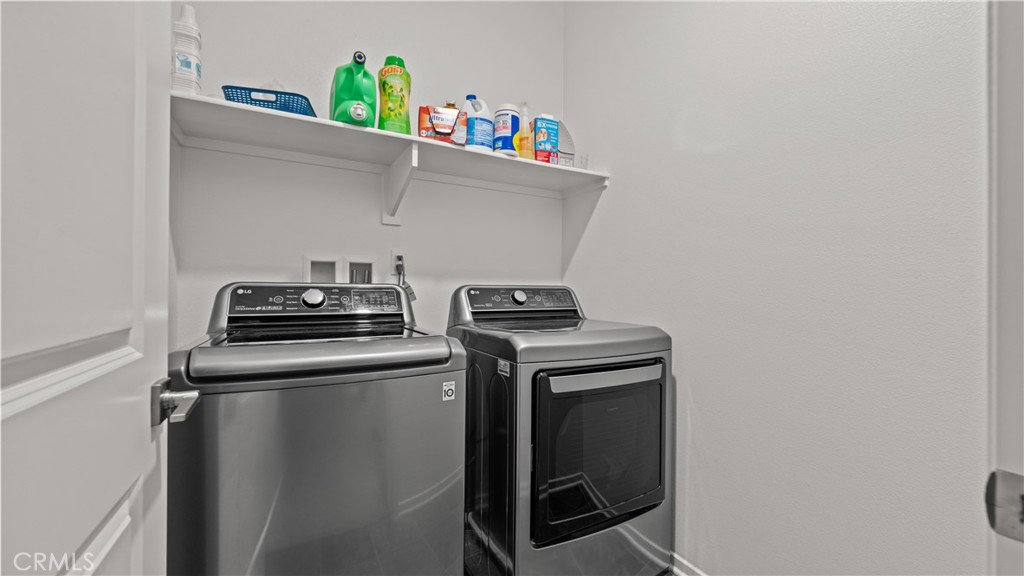 5604 Altamura Way, Unit 8 Fontana, CA 92336 - Photo 18 of 18 a utility room with dryer and washer