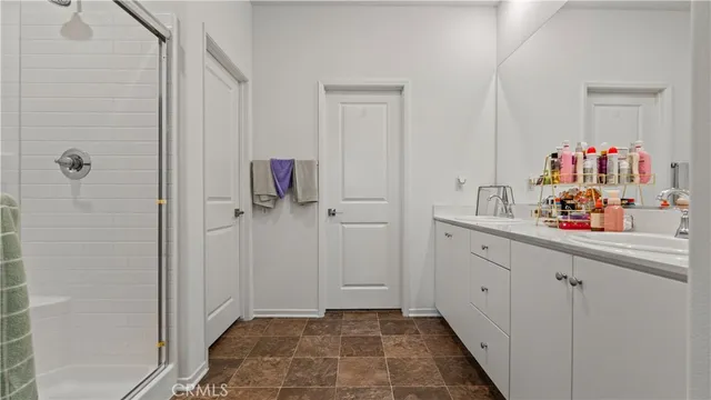 a bathroom with a sink and mirror