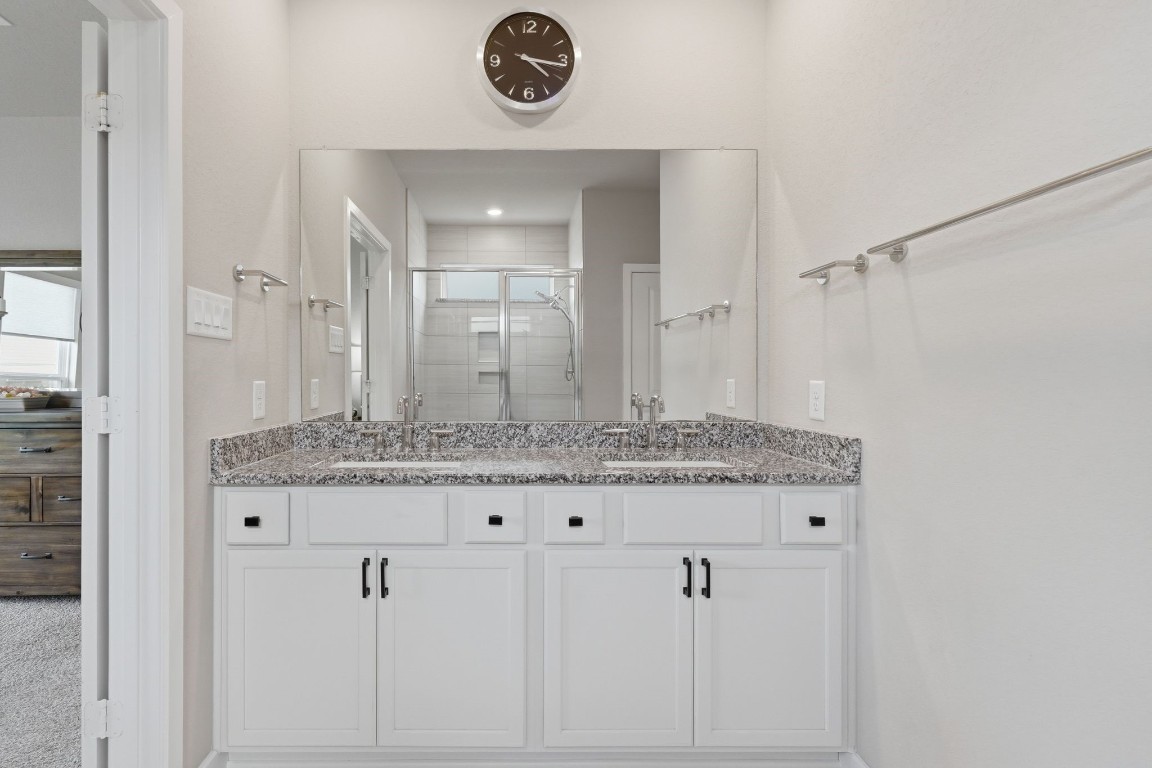 22006 Raburn Ranch Tomball, TX 77375 - Photo 22 of 50 Primary bathroom with double sinks.