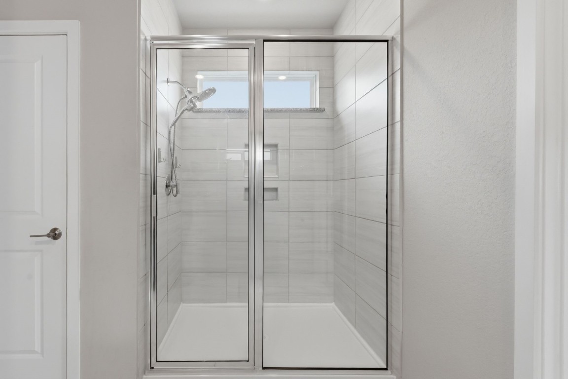 22006 Raburn Ranch Tomball, TX 77375 - Photo 23 of 50 Large shower in the primary bathroom.