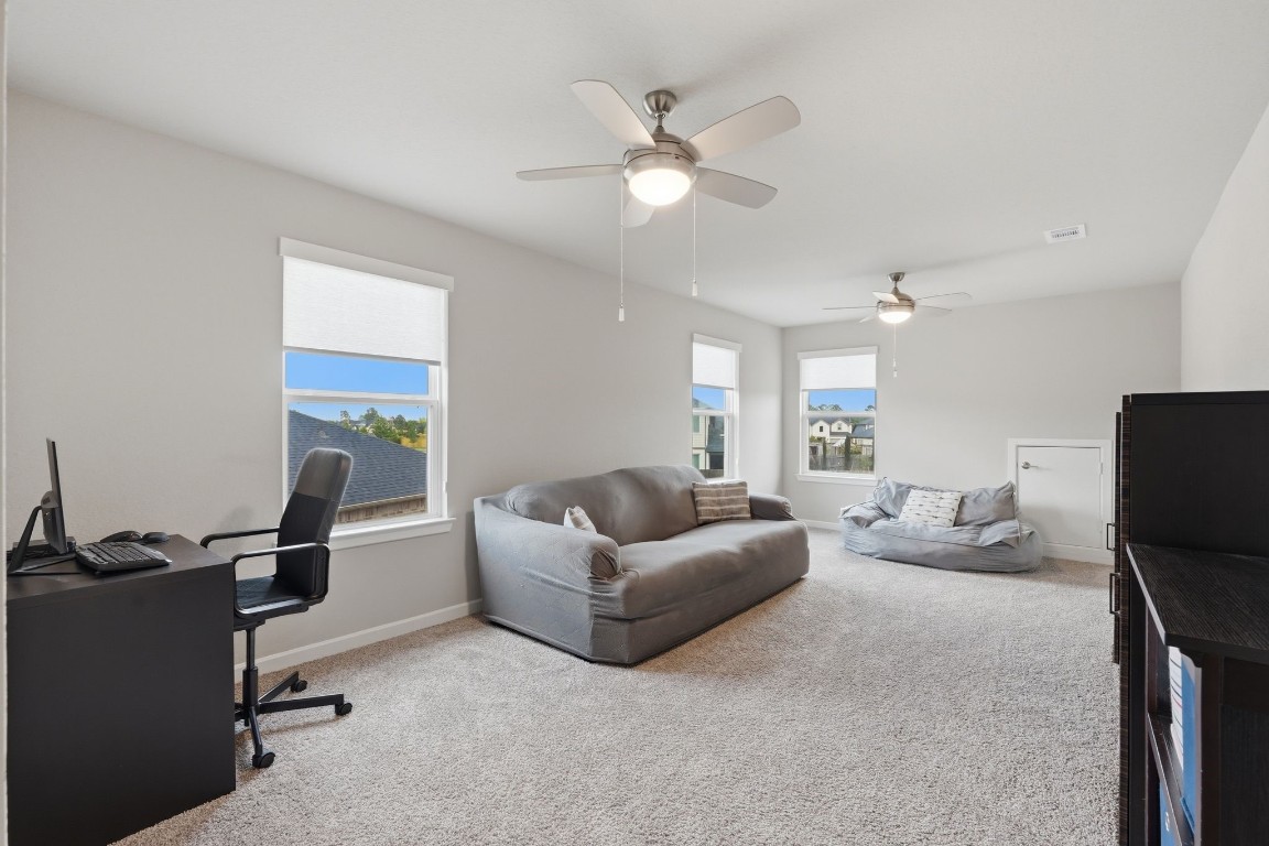 22006 Raburn Ranch Tomball, TX 77375 - Photo 28 of 50 Game room with lots of room for endless options to transform this space into your own.