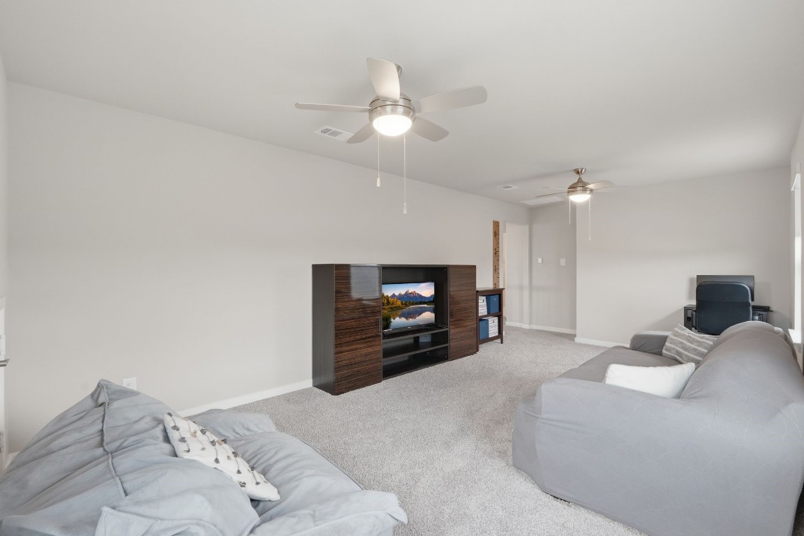 22006 Raburn Ranch Tomball, TX 77375 - Photo 29 of 50 Playroom, game room, craft room, man cave, you name it-this is the space for it!