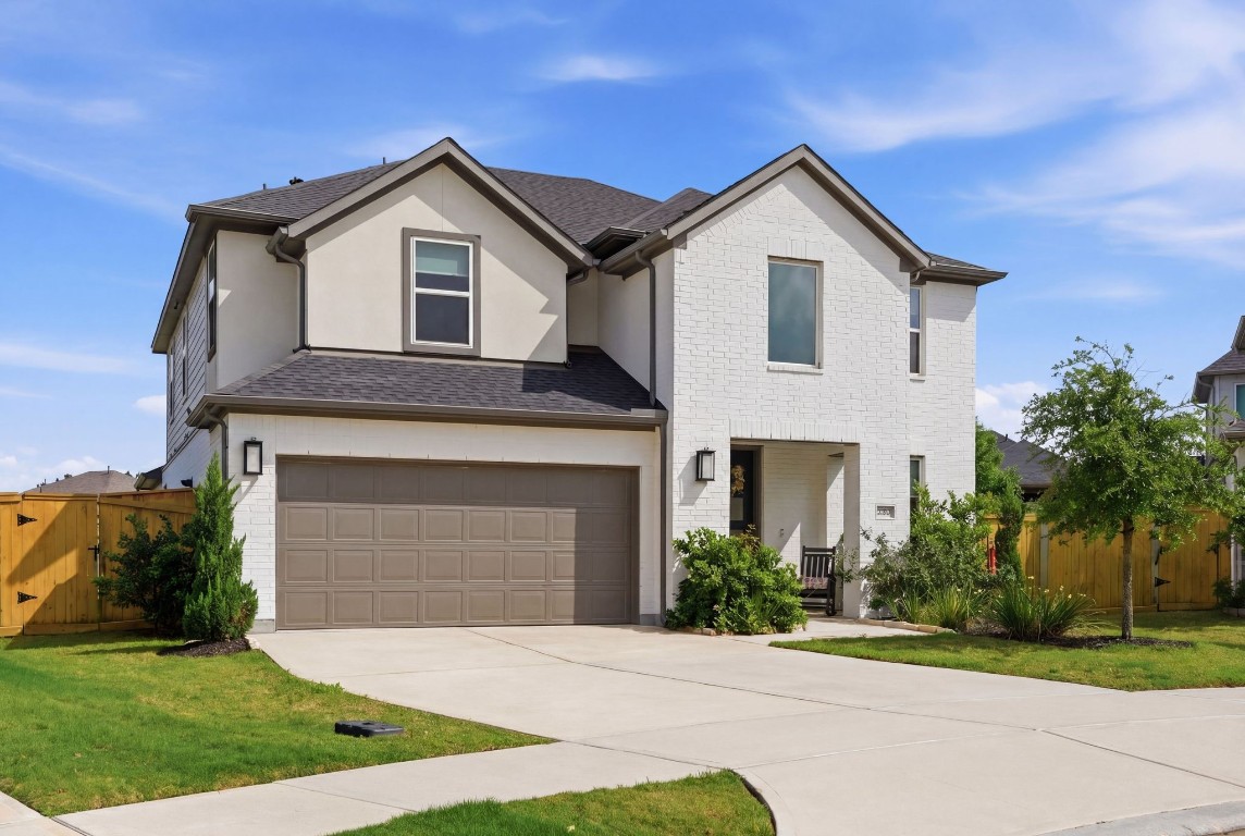 22006 Raburn Ranch Tomball, TX 77375 - Photo 3 of 50 Lots of beautiful curb appeal on this one.