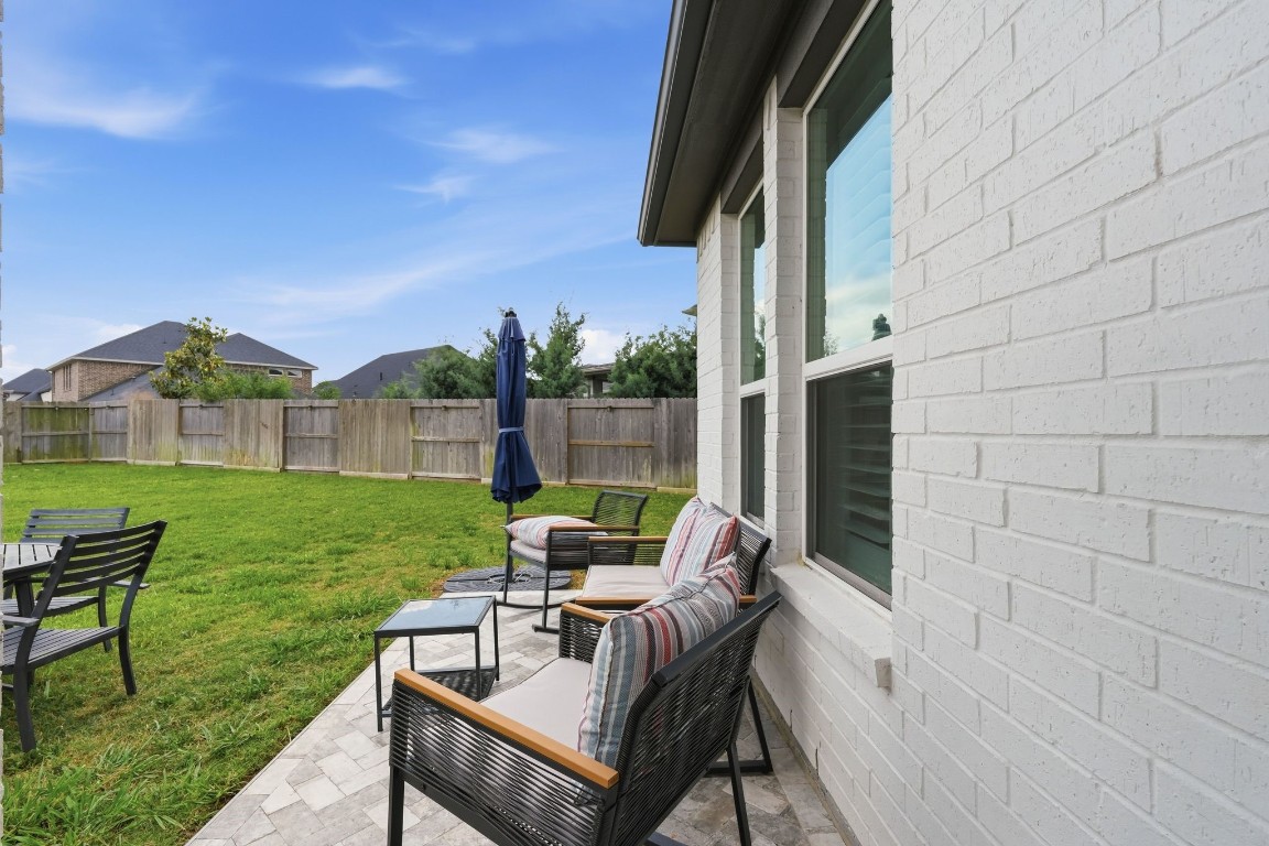 22006 Raburn Ranch Tomball, TX 77375 - Photo 38 of 50 Extended patio area overlooking the beautiful huge lot.