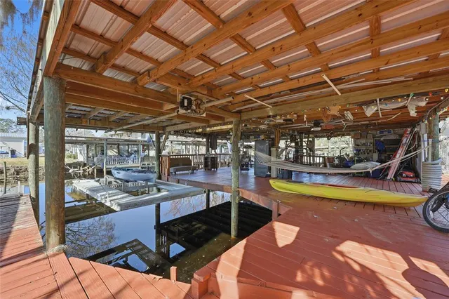 a view of a swimming pool with seating area