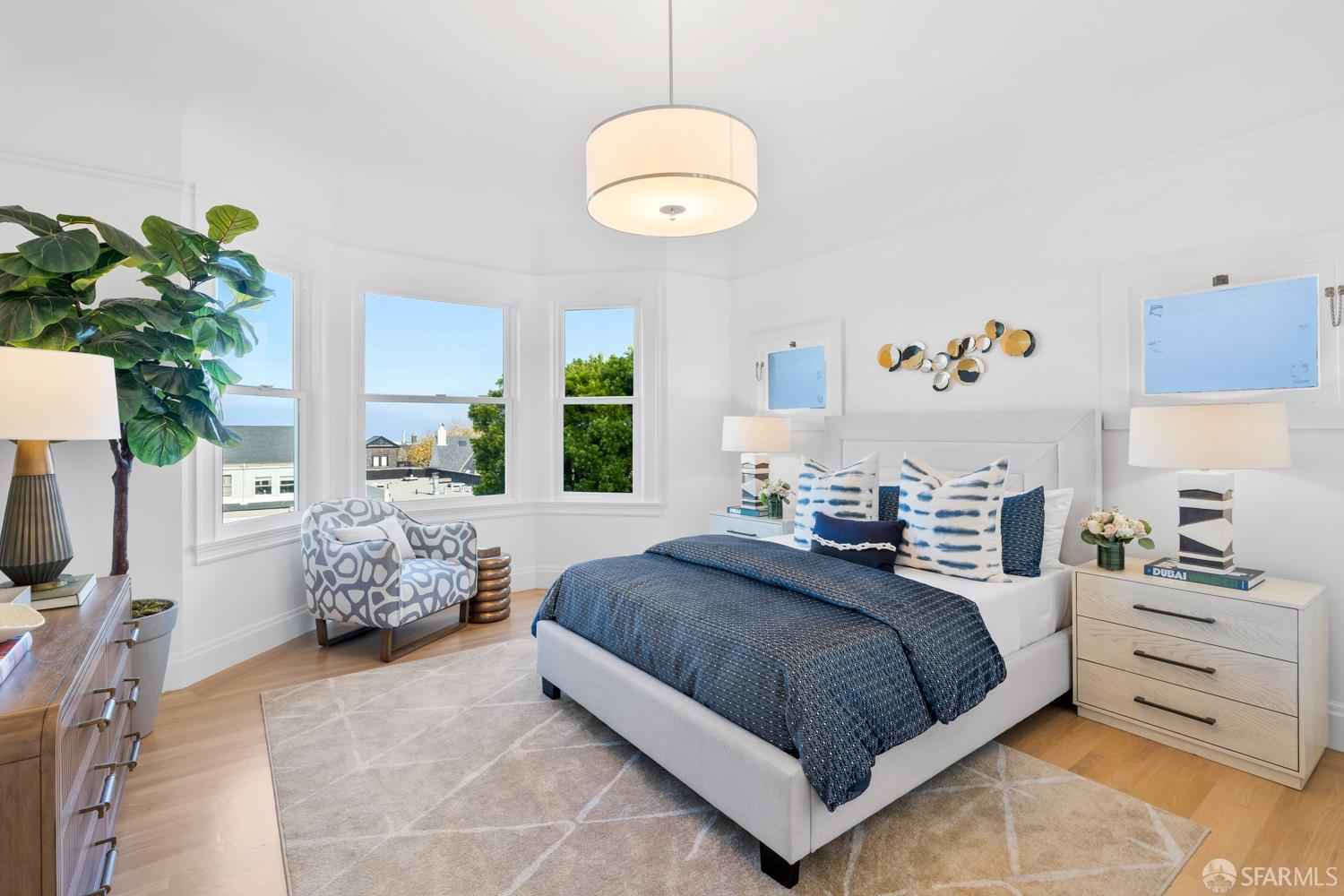 2650 Union Street San Francisco, CA 94123 - Photo 9 of 14 a bedroom with a bed and a chandelier