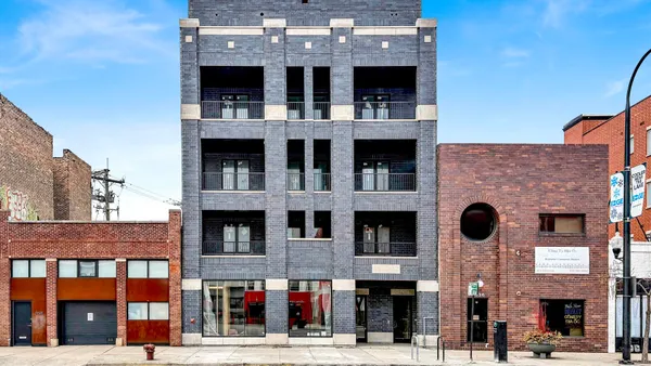 a front view of a multi story building