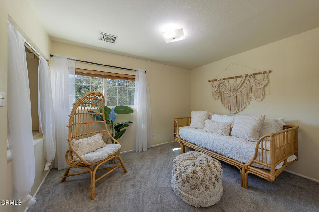 10522-62 Creek Road Ojai, CA 93023 - Photo 17 of 20 a living room with furniture and a window