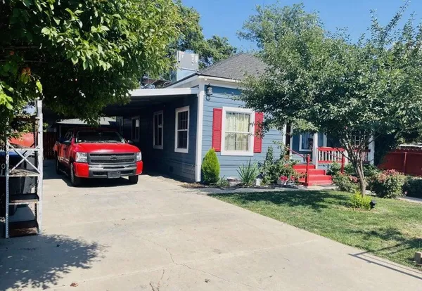 a house with trees in front of it