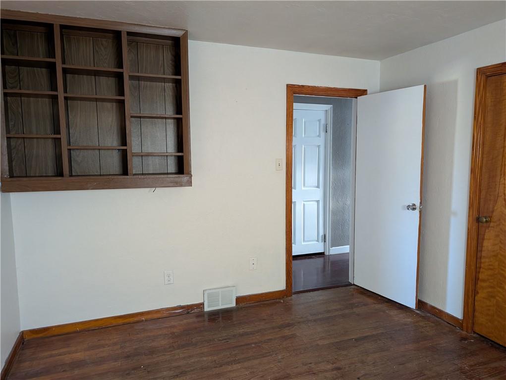 9701 Wilson Street Irwin, PA 15642 - Photo 11 of 20 a view of a small space with wooden floor and closet