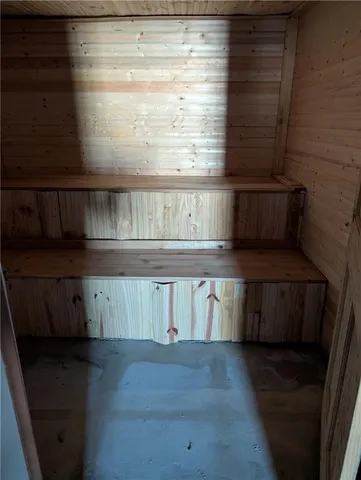 a bathroom with a toilet and a sink