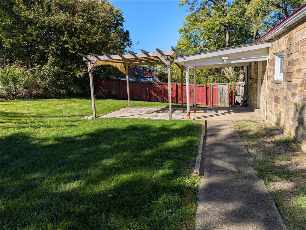 9701 Wilson Street Irwin, PA 15642 - Photo 2 of 20 a view of a house with a backyard