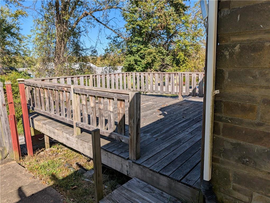 9701 Wilson Street Irwin, PA 15642 - Photo 6 of 20 a view of wooden balcony