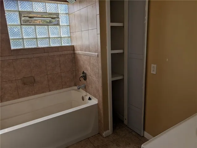 a bathroom with a bathtub