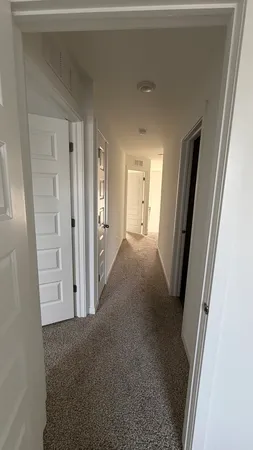 a view of empty room with closet