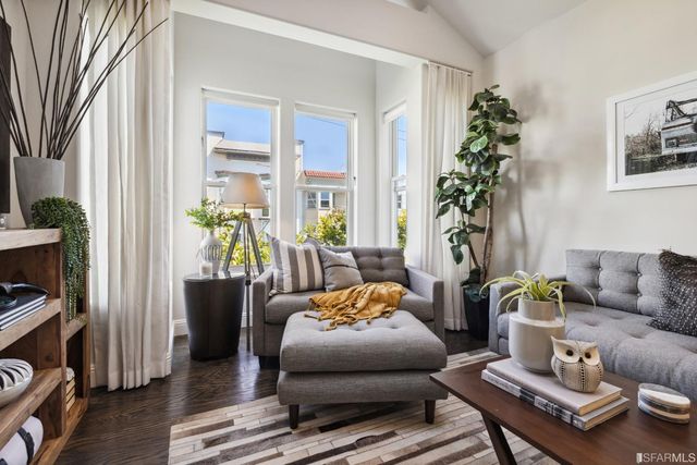 a view of a terrace with couches and a table