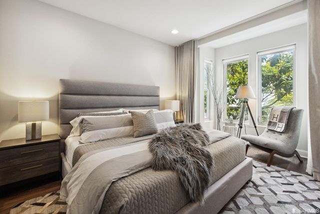 a view of a hallway with washer and dryer