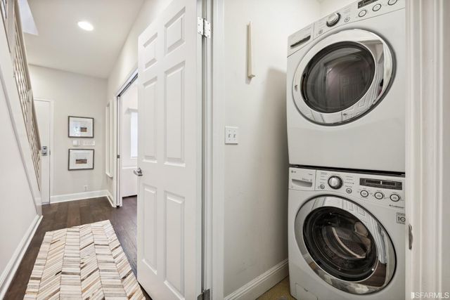 a kitchen with stainless steel appliances granite countertop a stove a microwave and cabinets