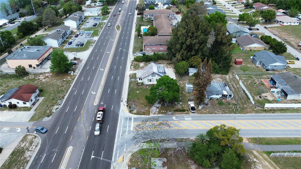 980 South Lake Shore Way Lake Alfred, FL 33850 - Photo 4 of 6 an aerial view of residential houses with outdoor space
