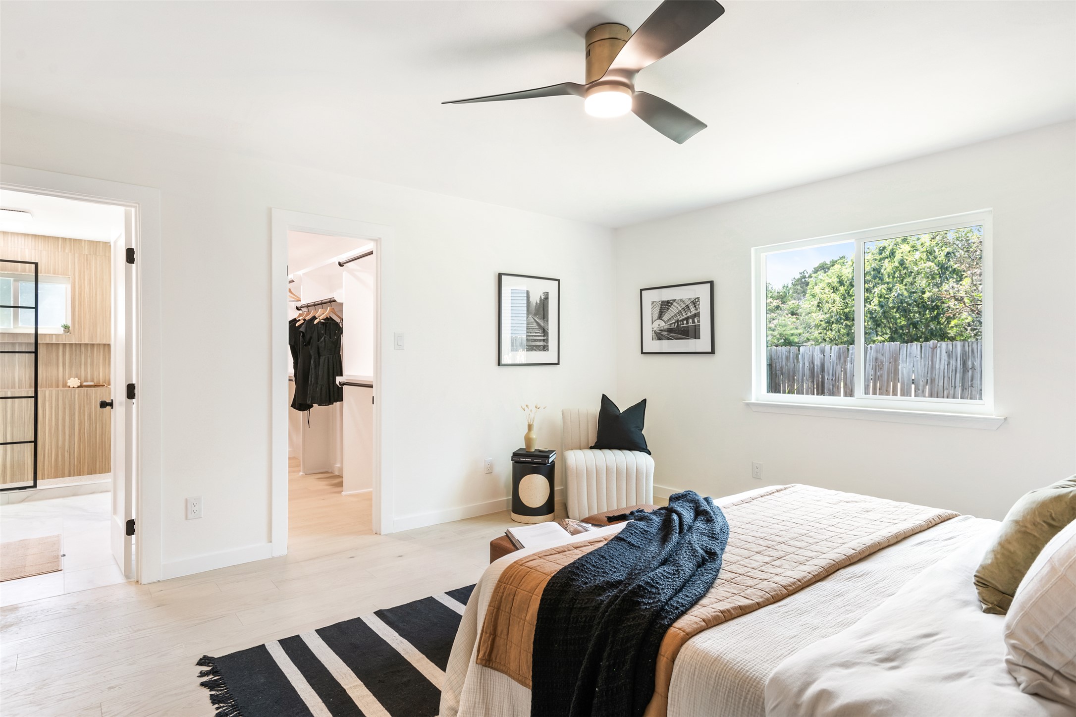 7604 Islander Drive Austin, TX 78749 - Photo 27 of 38 Comfortable bedroom with bright wood flooring and a refreshing ceiling fan.