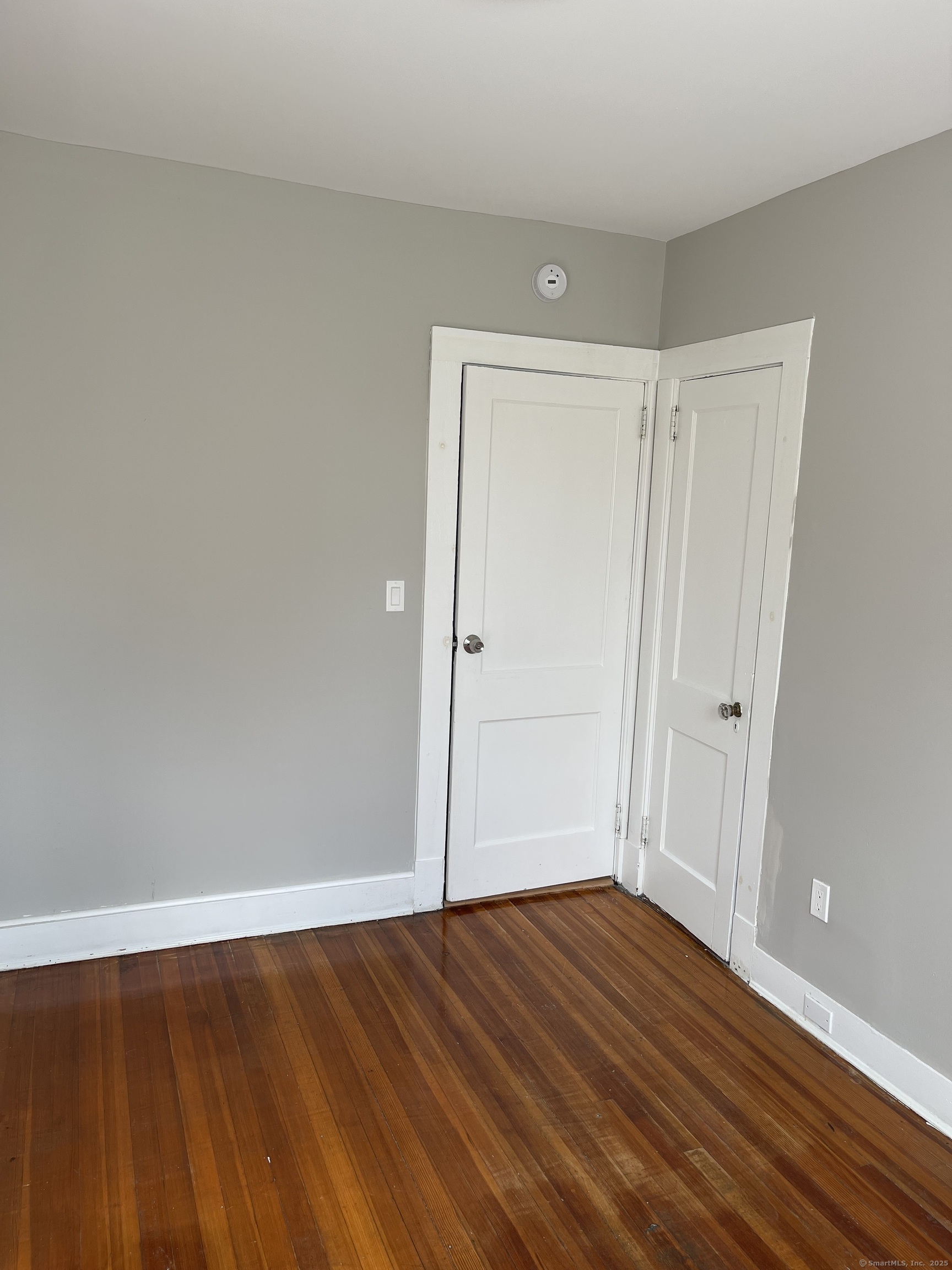 80 Hazel Street Hartford, CT 06106 - Photo 16 of 32 a view of an empty room with wooden floor
