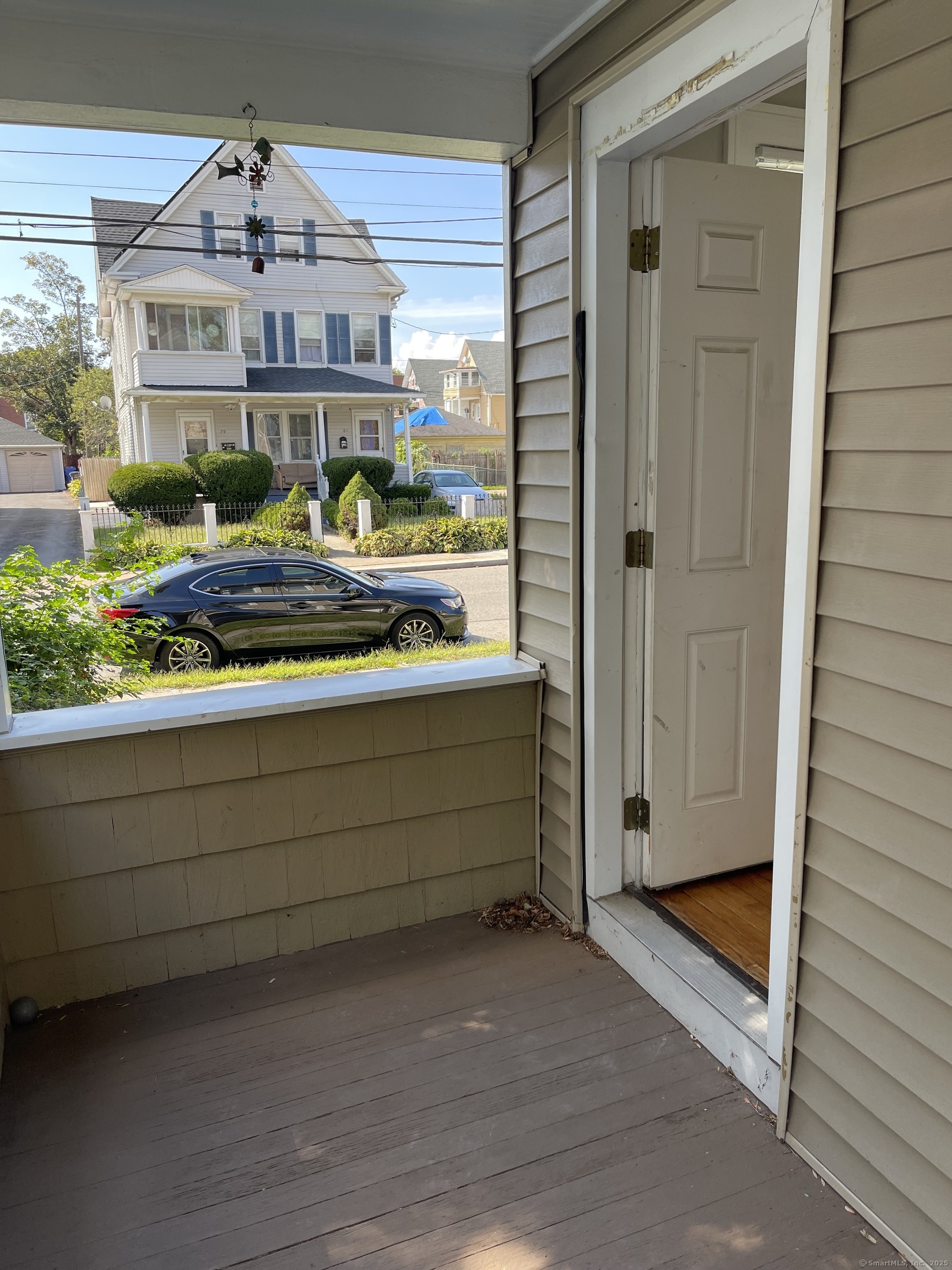 80 Hazel Street Hartford, CT 06106 - Photo 23 of 32 a view of a porch with a bench