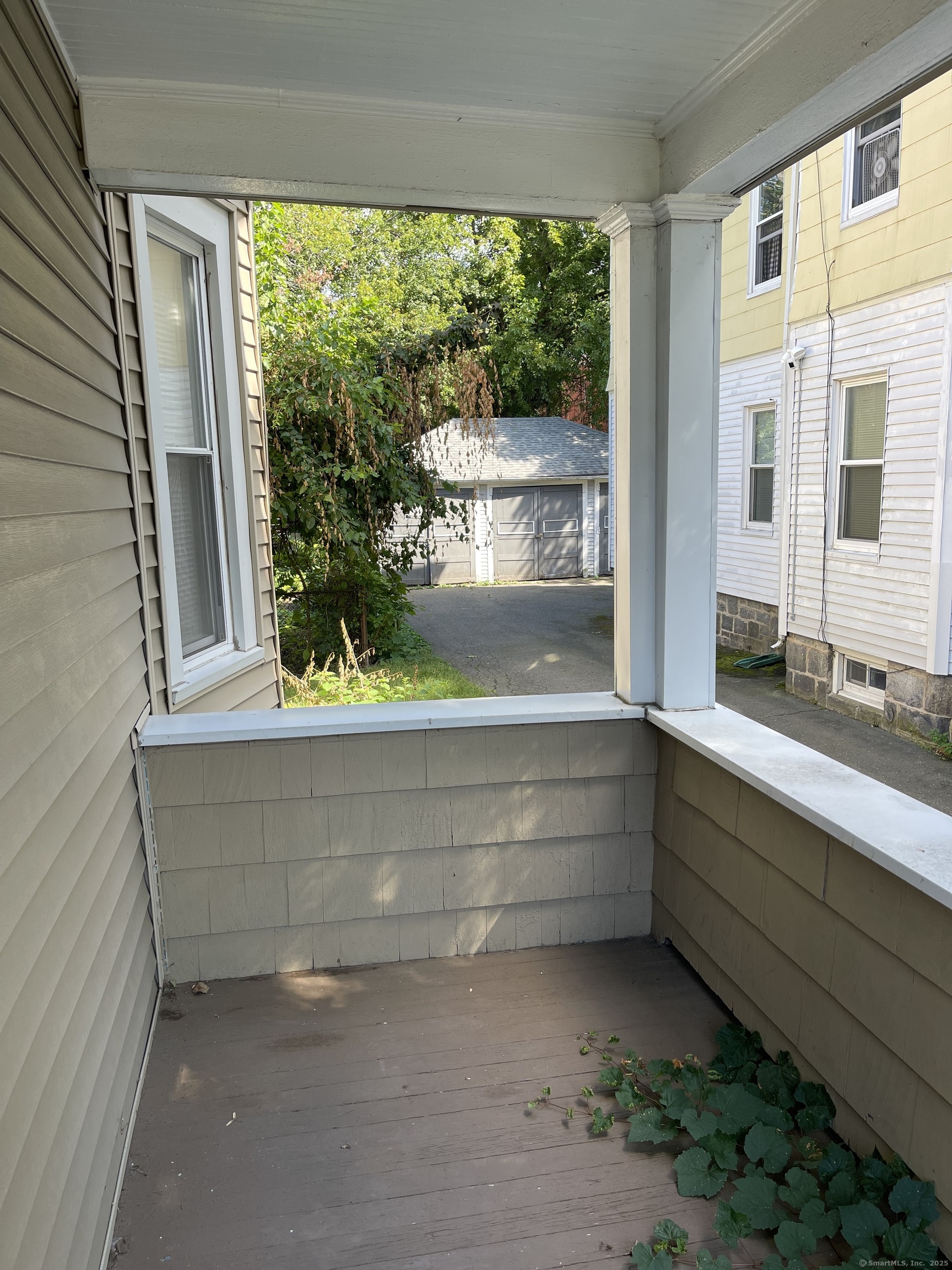 80 Hazel Street Hartford, CT 06106 - Photo 24 of 32 a view of room with window and front door