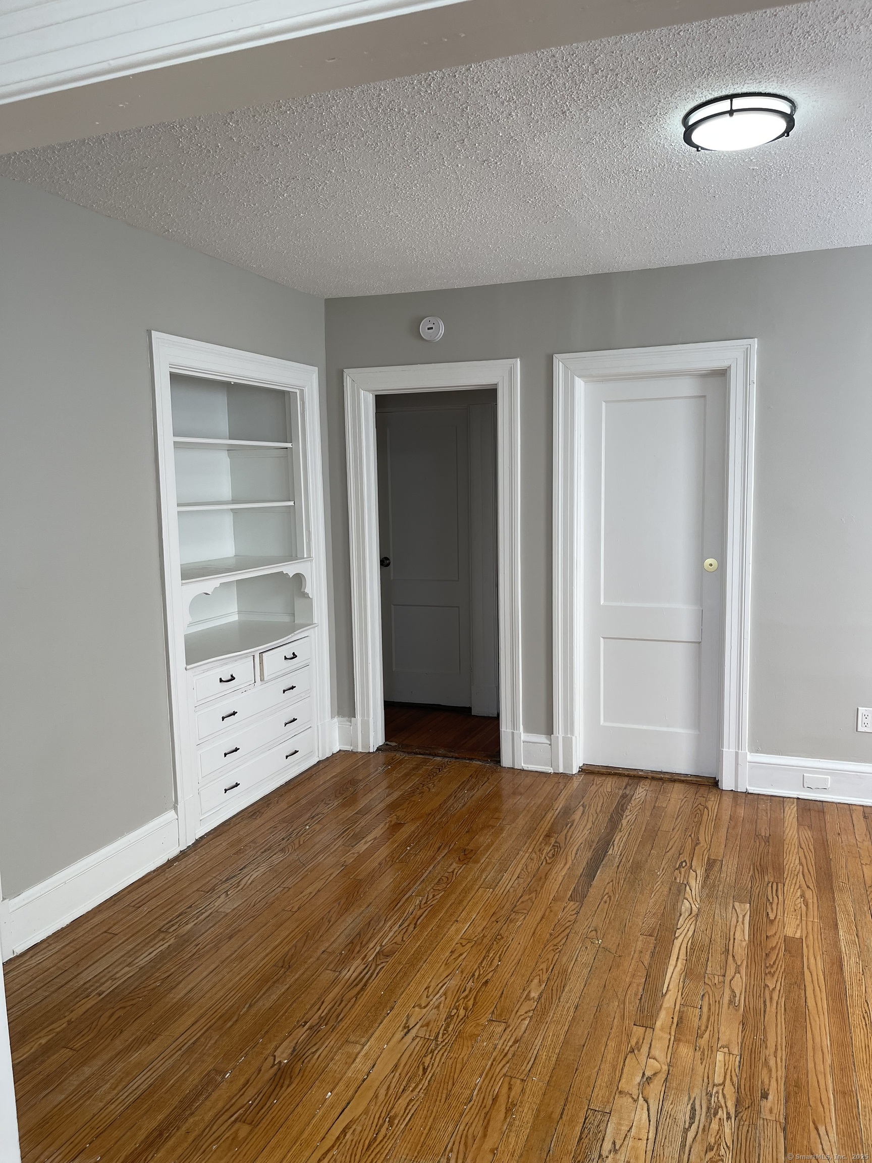 80 Hazel Street Hartford, CT 06106 - Photo 27 of 32 a view of an empty room with closet and a window