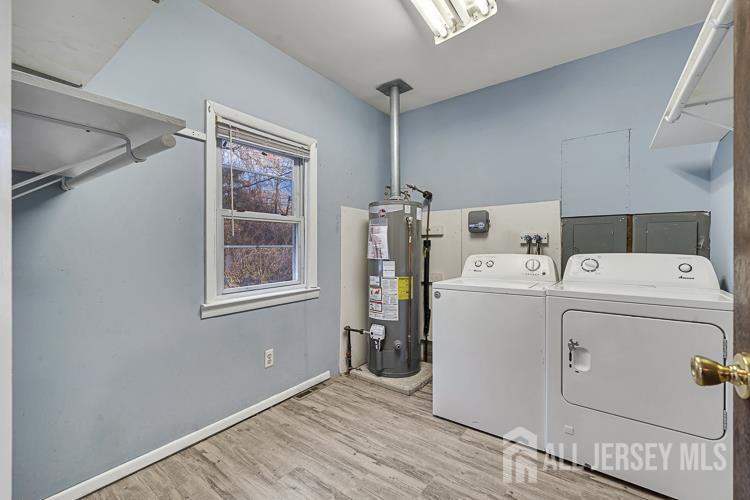 746 Spruce Road North Brunswick, NJ 08902 - Photo 13 of 29 a utility room with dryer and washer